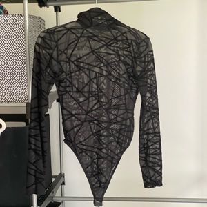 Black mesh body suit